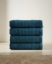 Pidada Hand Towel Set styled in a bright organic modern bathroom
