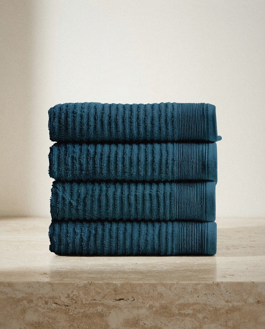 Pidada Hand Towel Set styled in a bright organic modern bathroom
