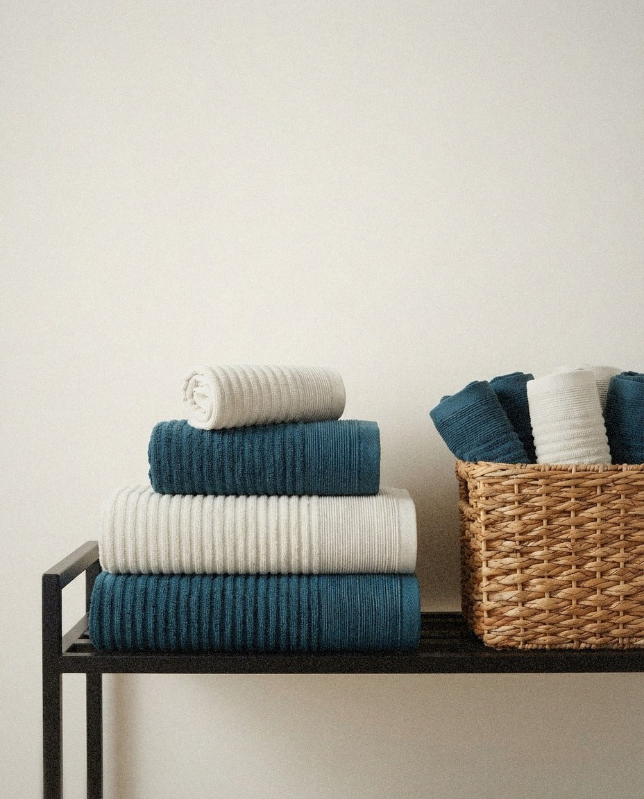 Pidada Hand Towel Set detail in a warm minimalist bathroom