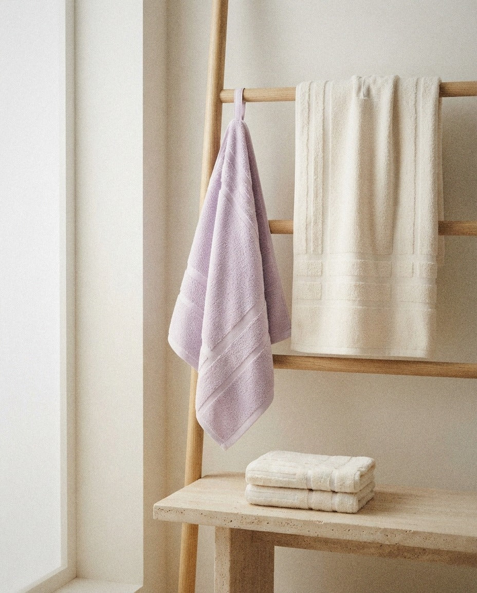 Capri Cotton Bath Towels detail in a warm minimalist bathroom