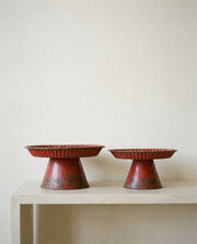 Decorative Metal Pedestals -Distressed Red Finish in a light organic modern interior