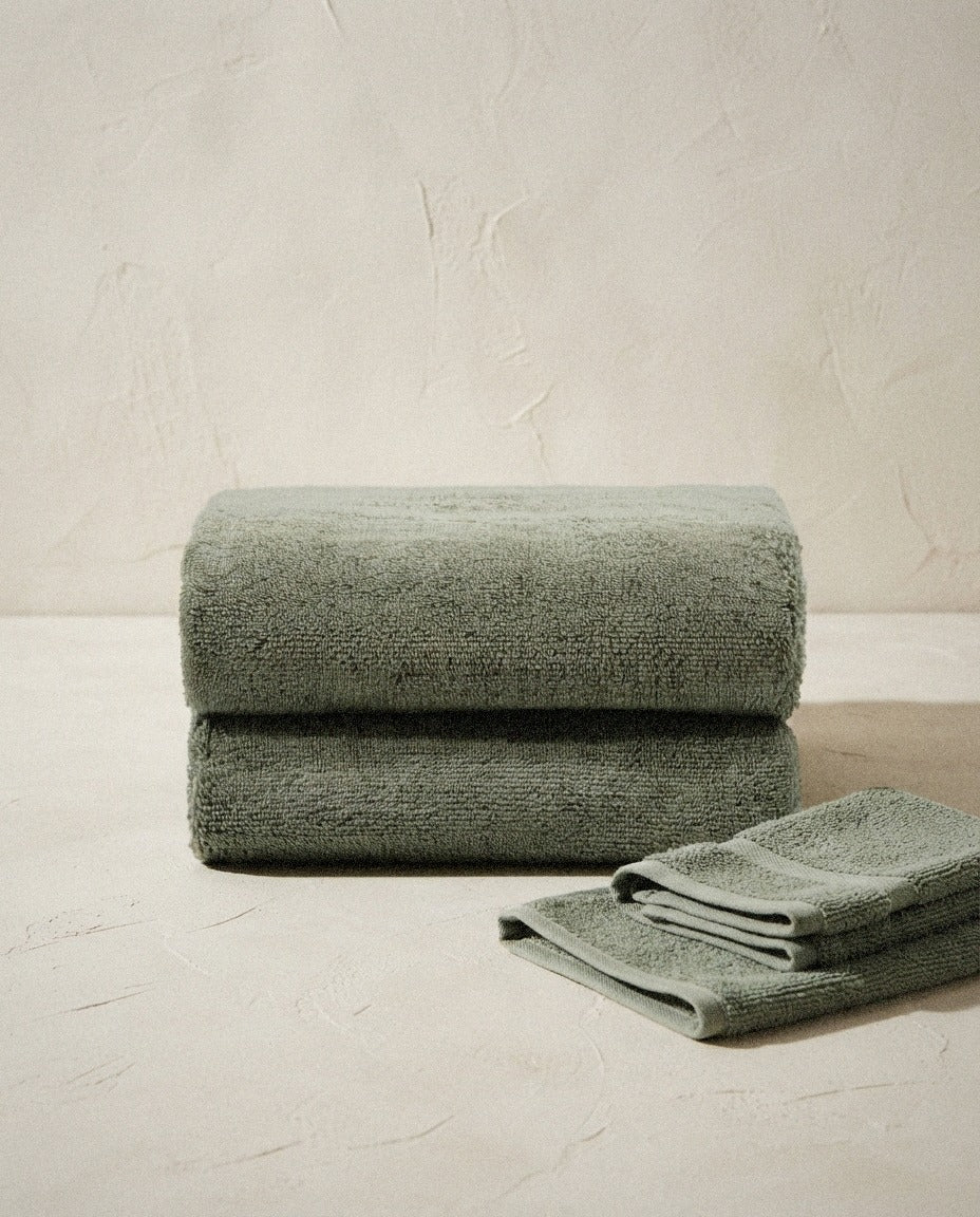 Deia Cotton Bath Towels styled in a bright organic modern bathroom