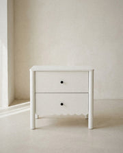 Emmeline Scalloped Nightstand in a light organic modern interior