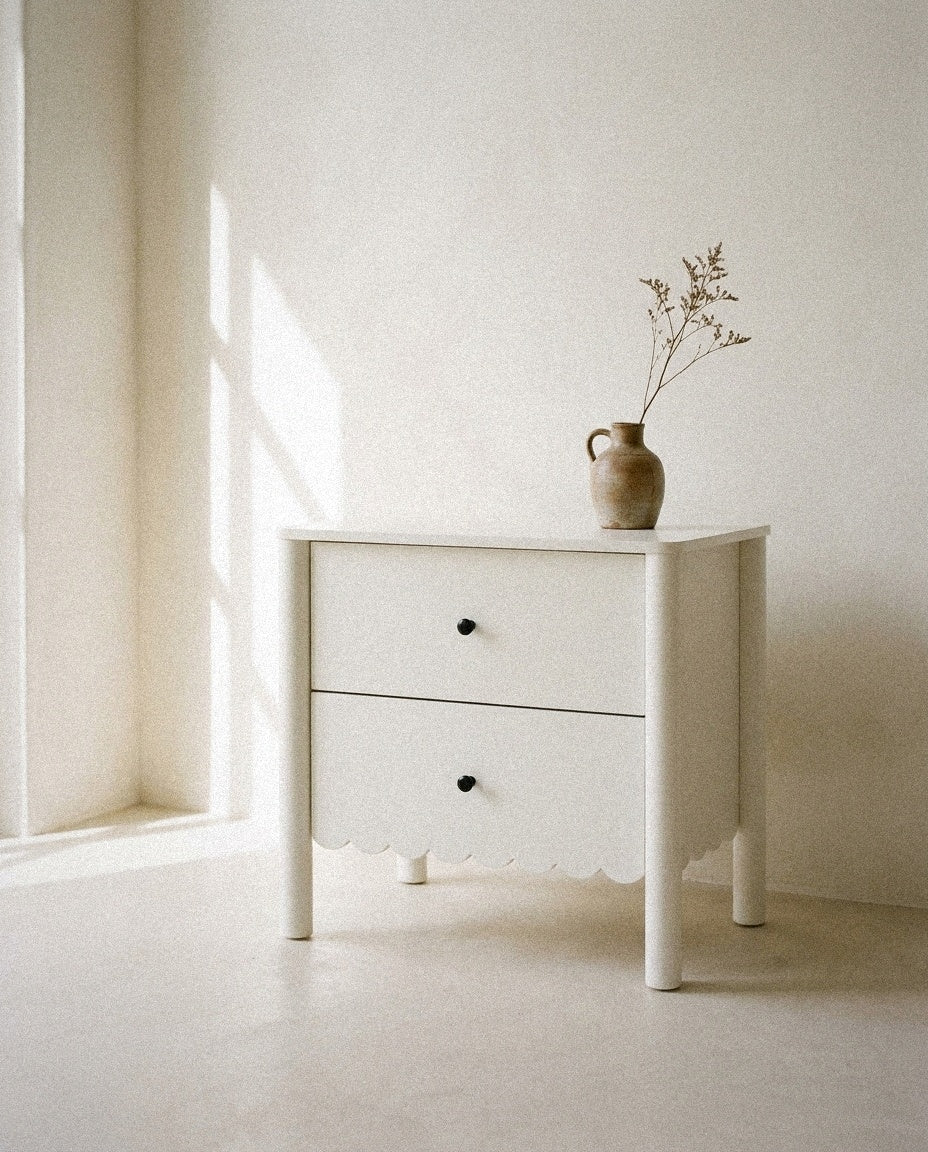 Emmeline Scalloped Nightstand styled in a minimal, sunlit room