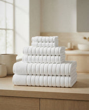 Karina Combed Cotton Bath Towel Set styled in a bright organic modern bathroom