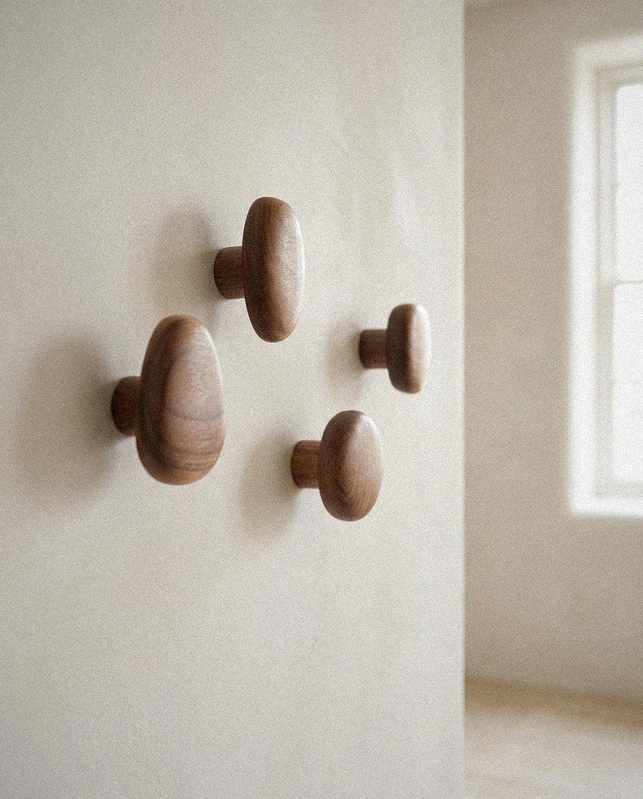 Close-up of Minimalist Wooden Pebble Wall Hook Set (4pcs) showing material and construction