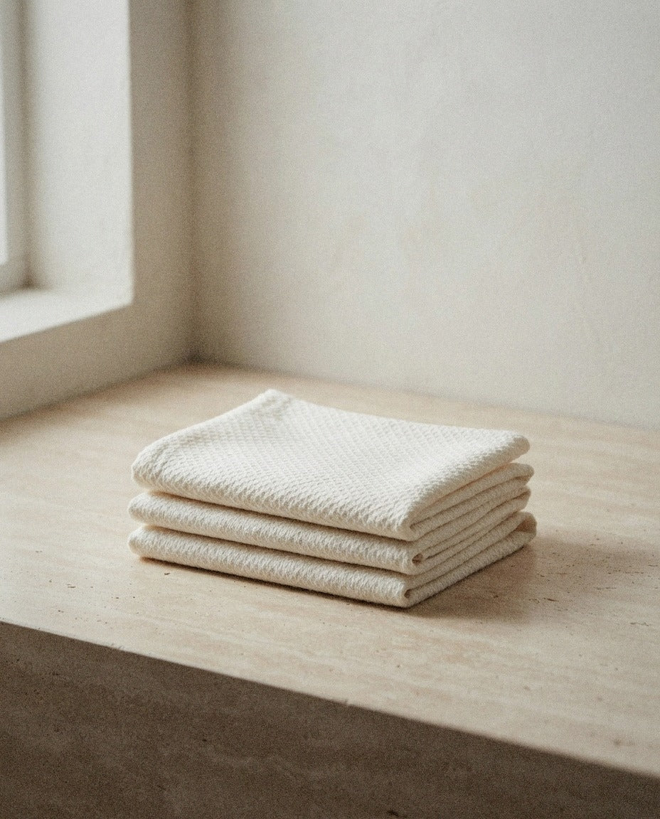 Organic Birdseye Washcloths styled in a bright organic modern bathroom