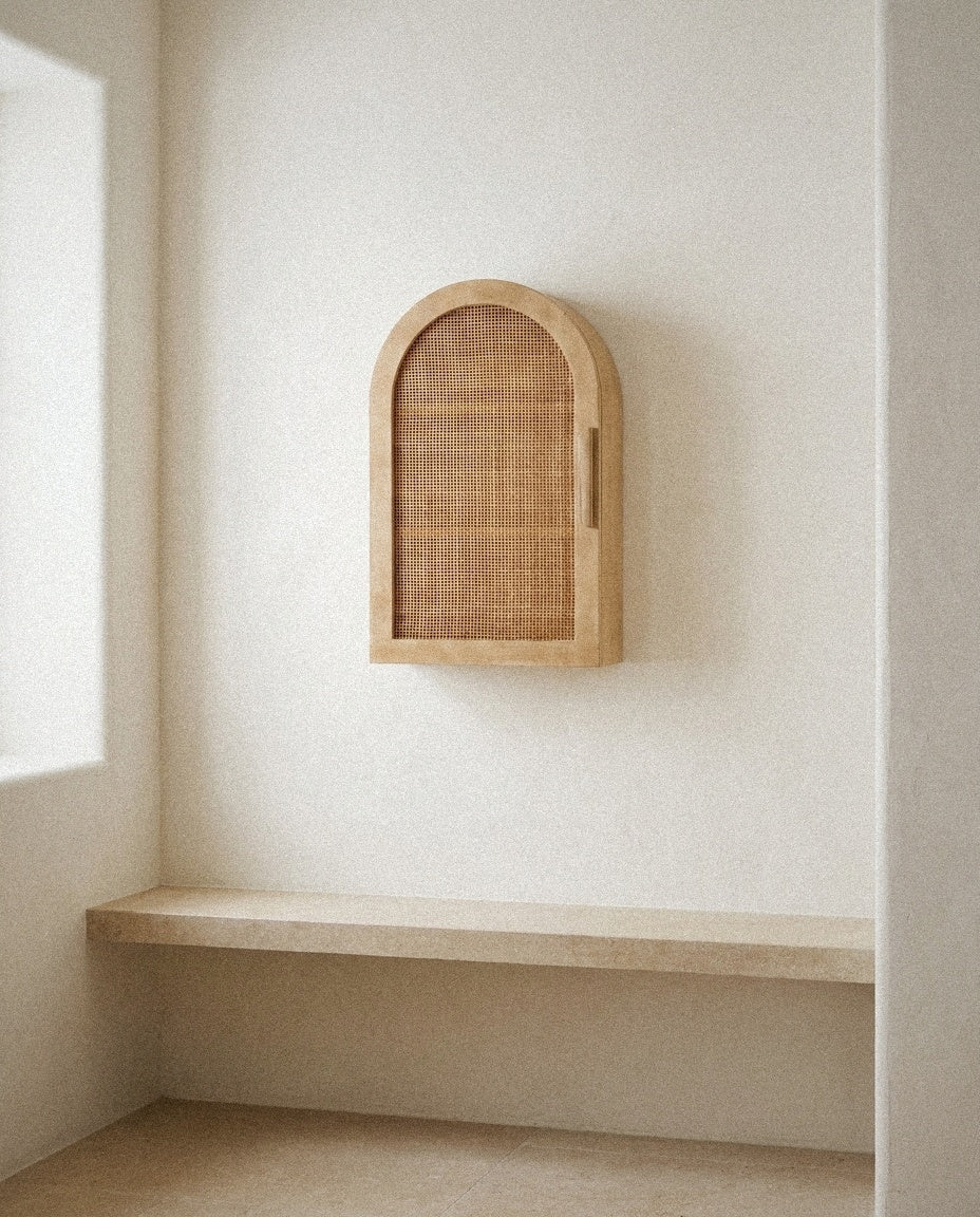 Ori Rattan Arch Wall Cabinet in a light organic modern interior