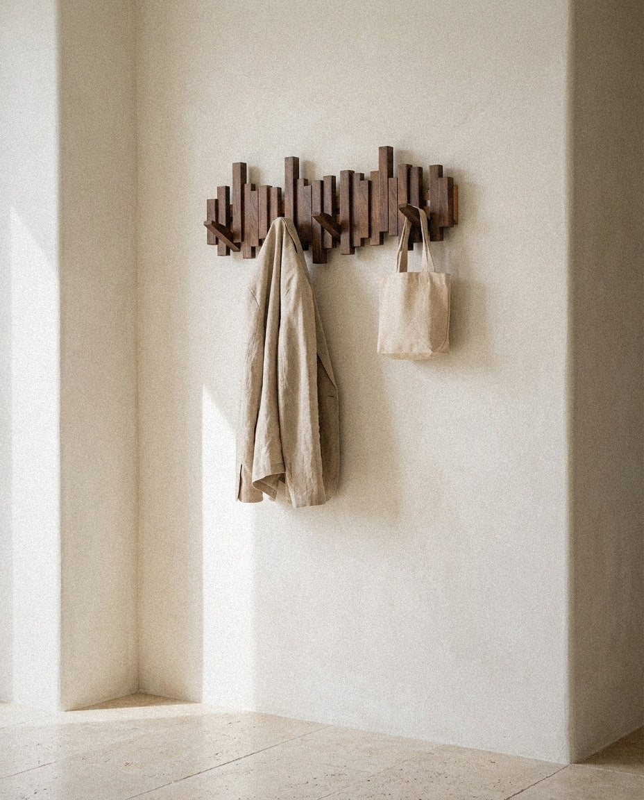 Piano Keys Wall Coat Rack styled in a minimal, sunlit room