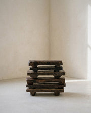Primitive Wood Stackable Pedestal in a light organic modern interior
