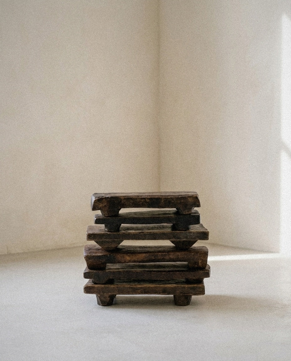 Primitive Wood Stackable Pedestal in a light organic modern interior