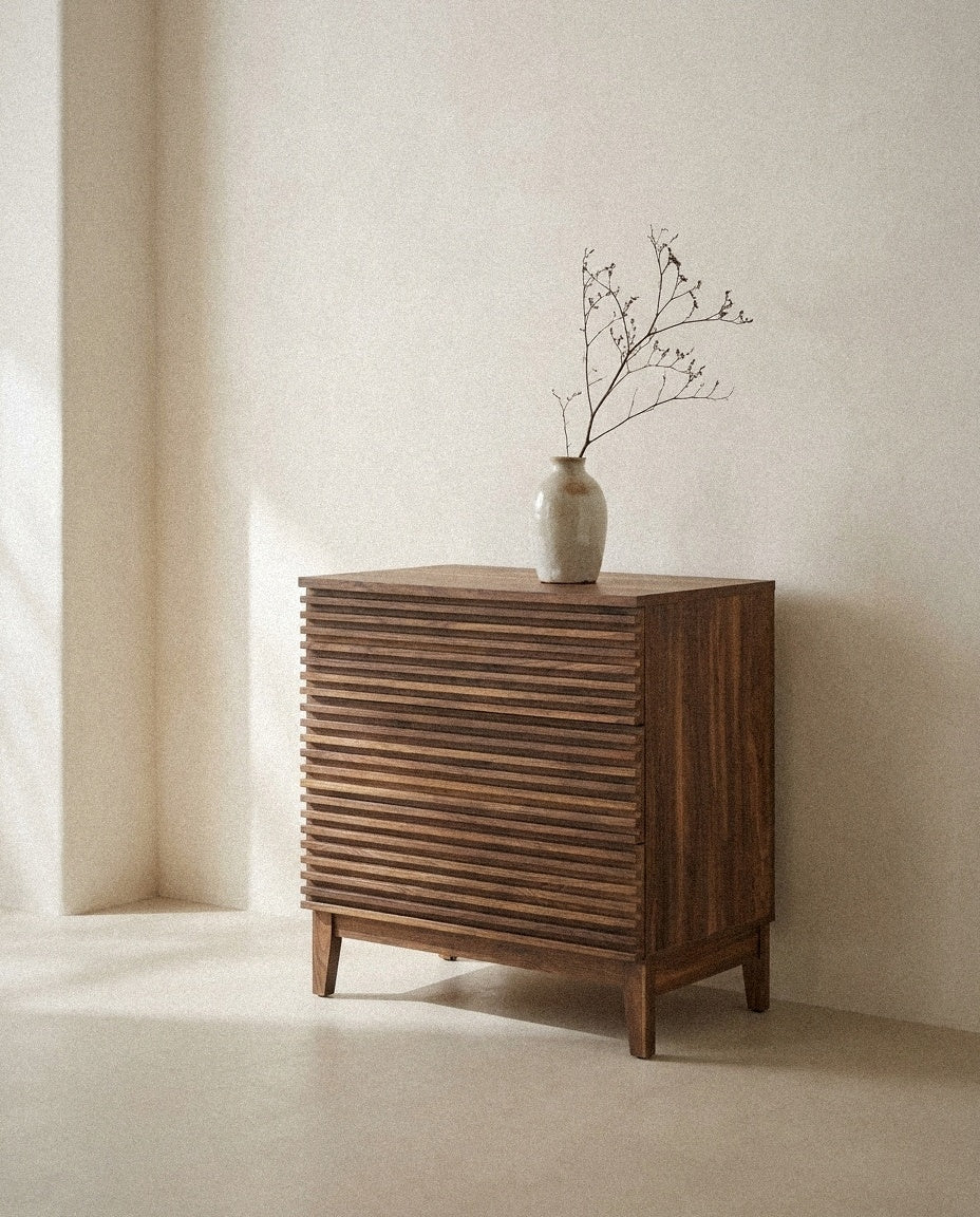 Render Large 3-Drawer Nightstand styled in a minimal, sunlit room