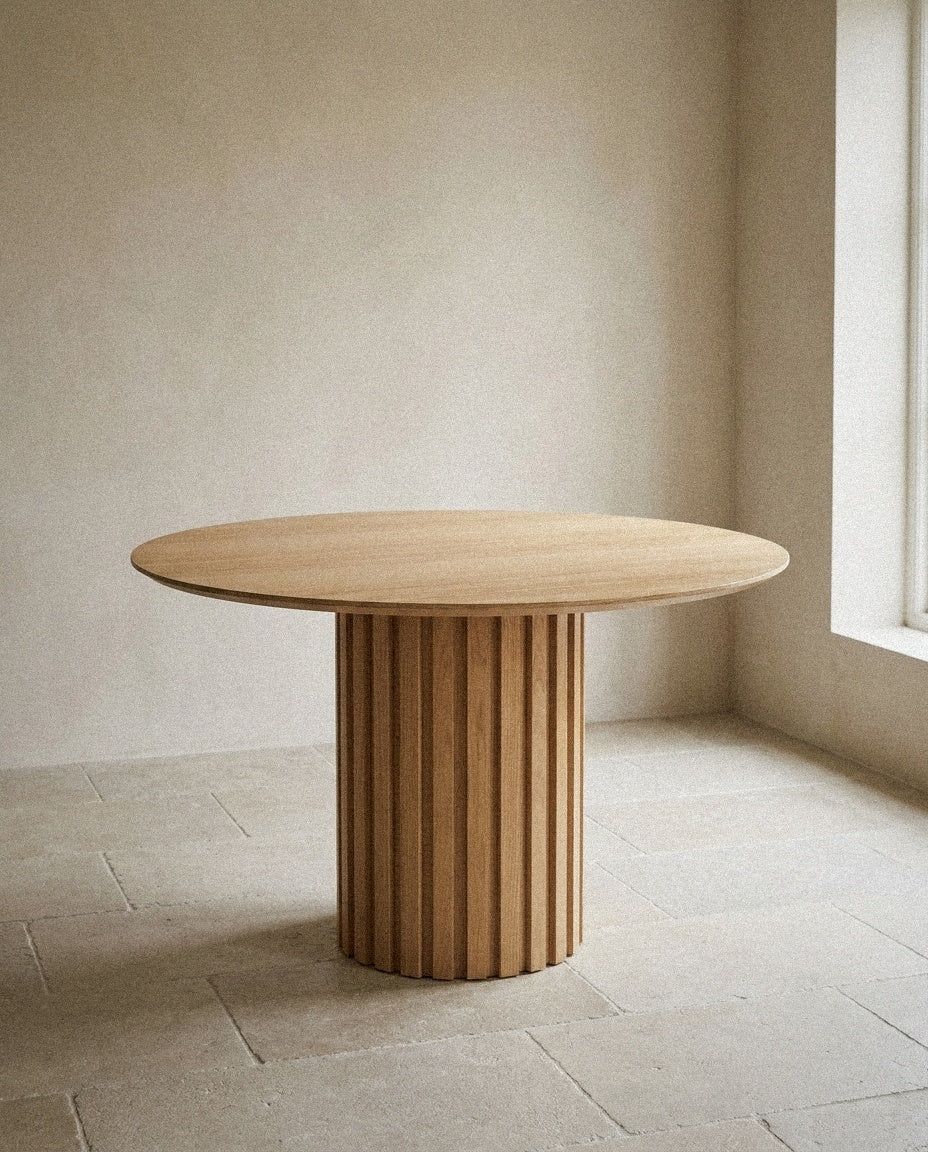 Senja Round Dining Table in a light organic modern interior