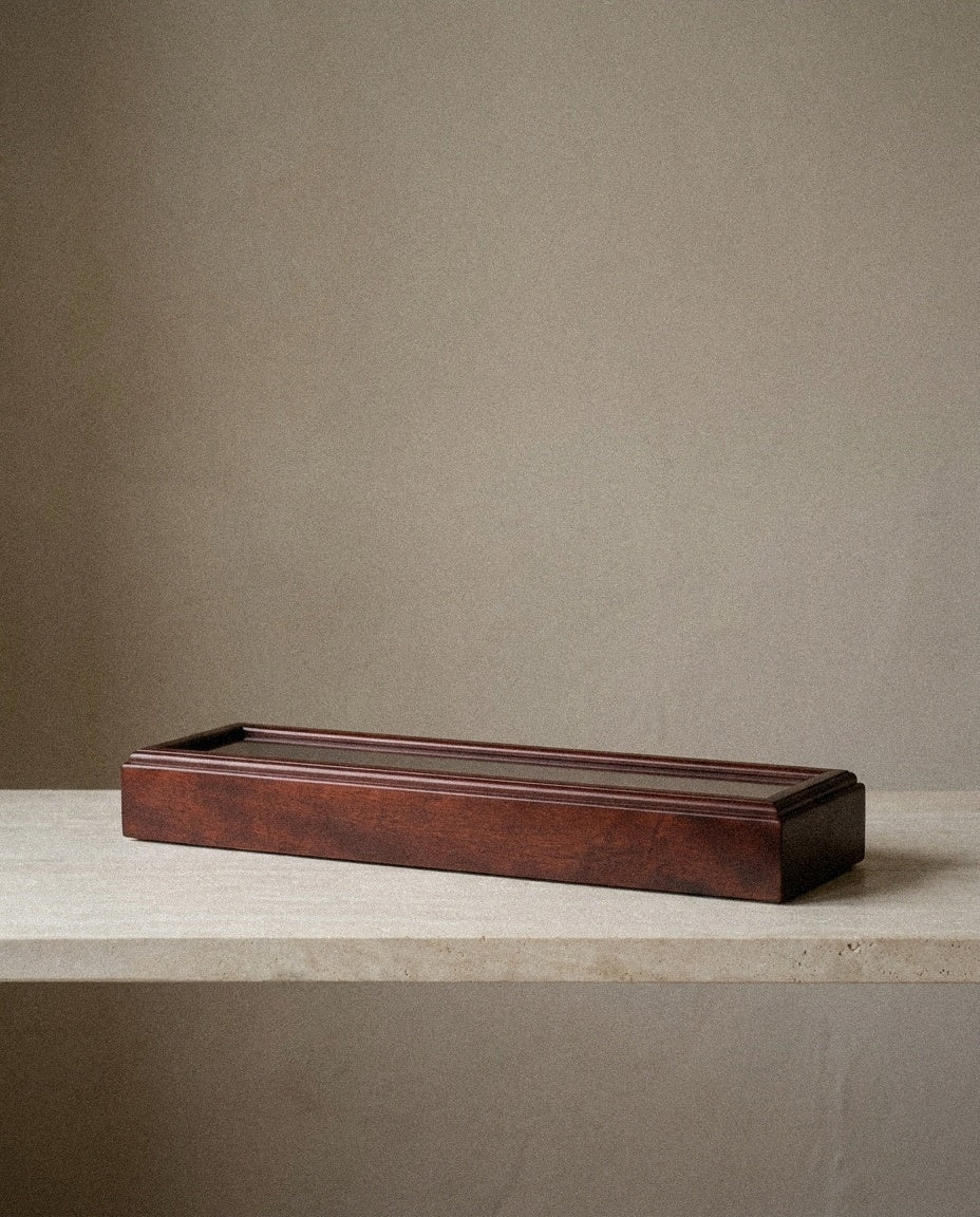 Solid Cherry Flag Display Case in a light organic modern interior