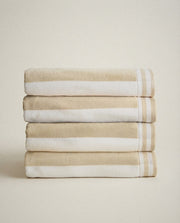 Cabana Striped Beach Towel styled in a bright organic modern bathroom