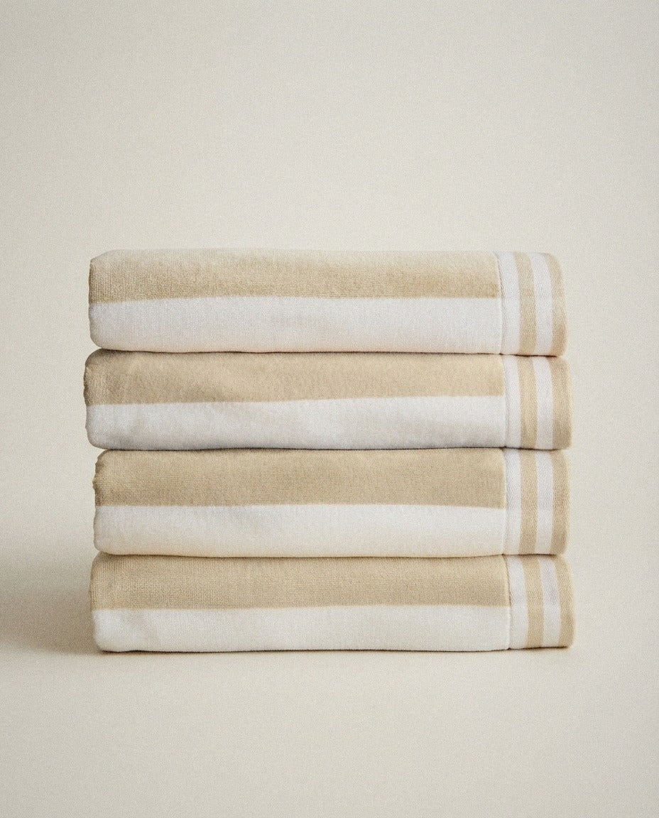 Cabana Striped Beach Towel styled in a bright organic modern bathroom