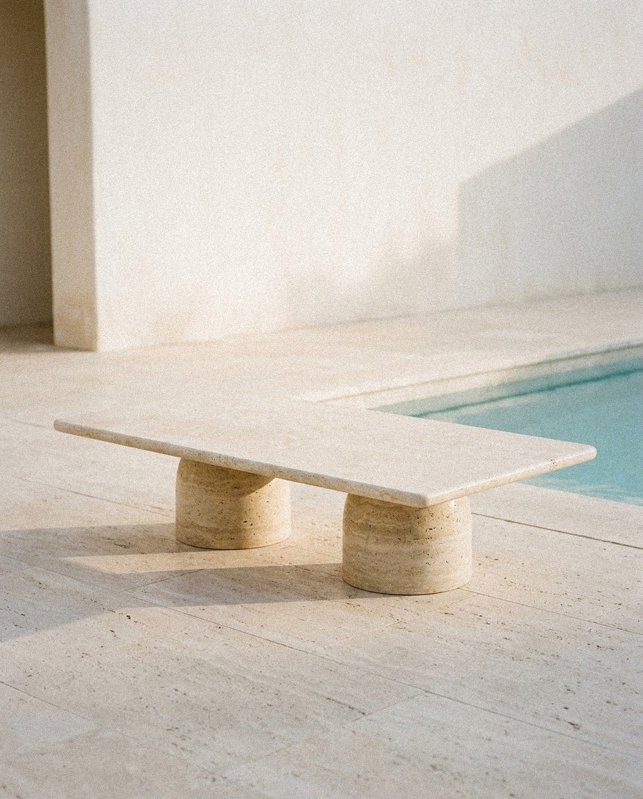 Travertine Sculptural Coffee Table in a light organic modern interior