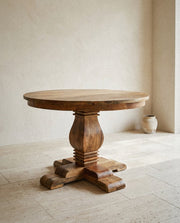 Valentina Round Wood Dining Table in a light organic modern interior