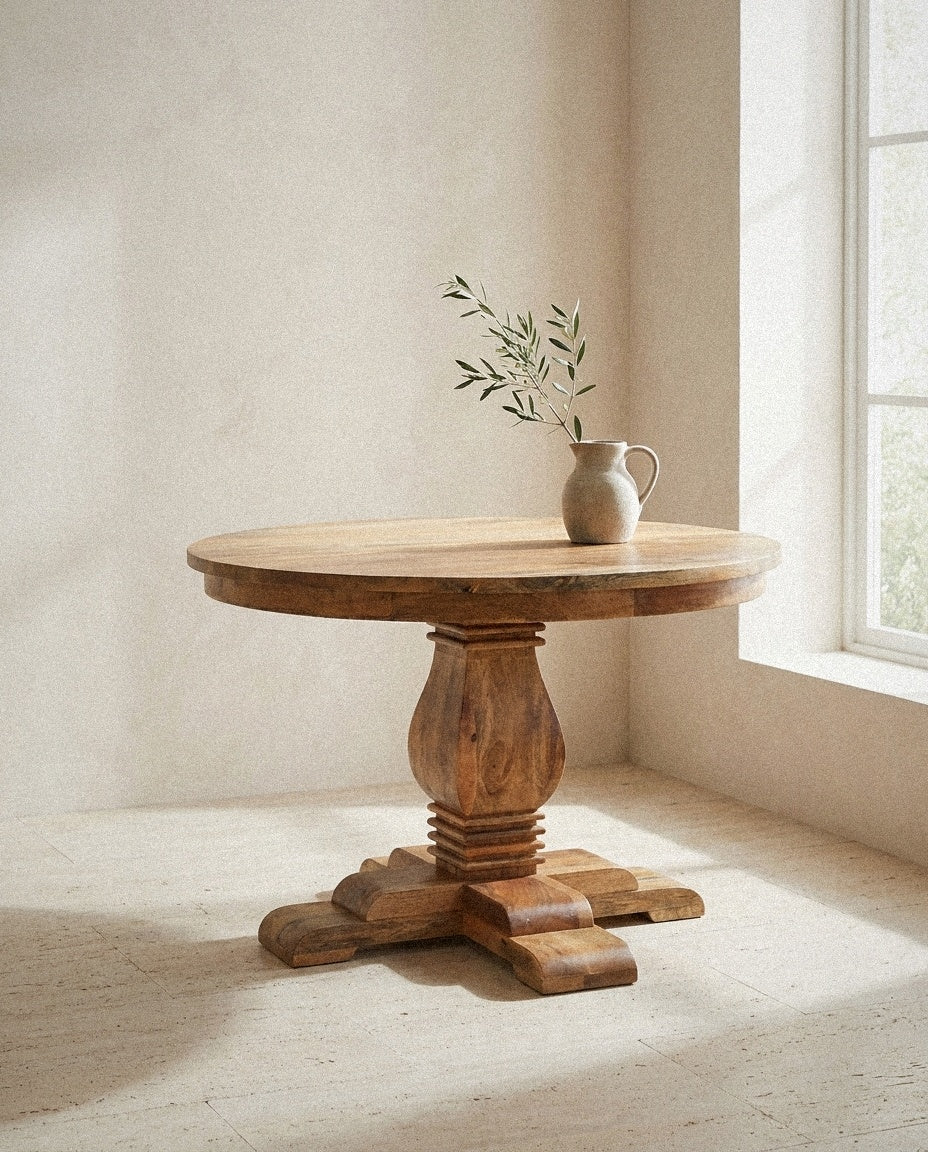 Valentina Round Wood Dining Table styled in a minimal, sunlit room
