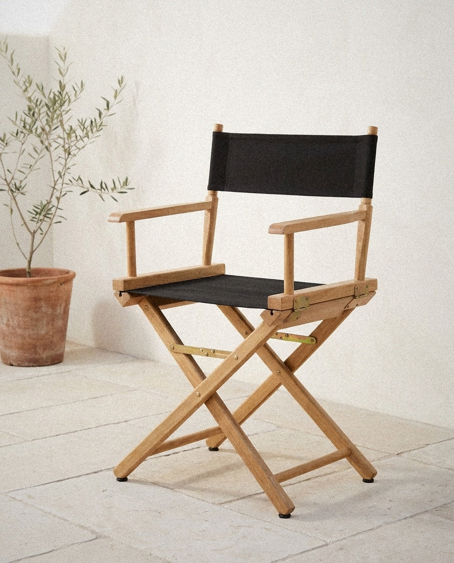 Wooden Director's Chair styled in a minimal, sunlit room