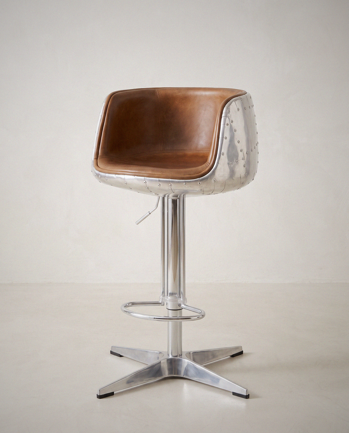 Aviator Leather Bar Stool in a bright organic modern interior