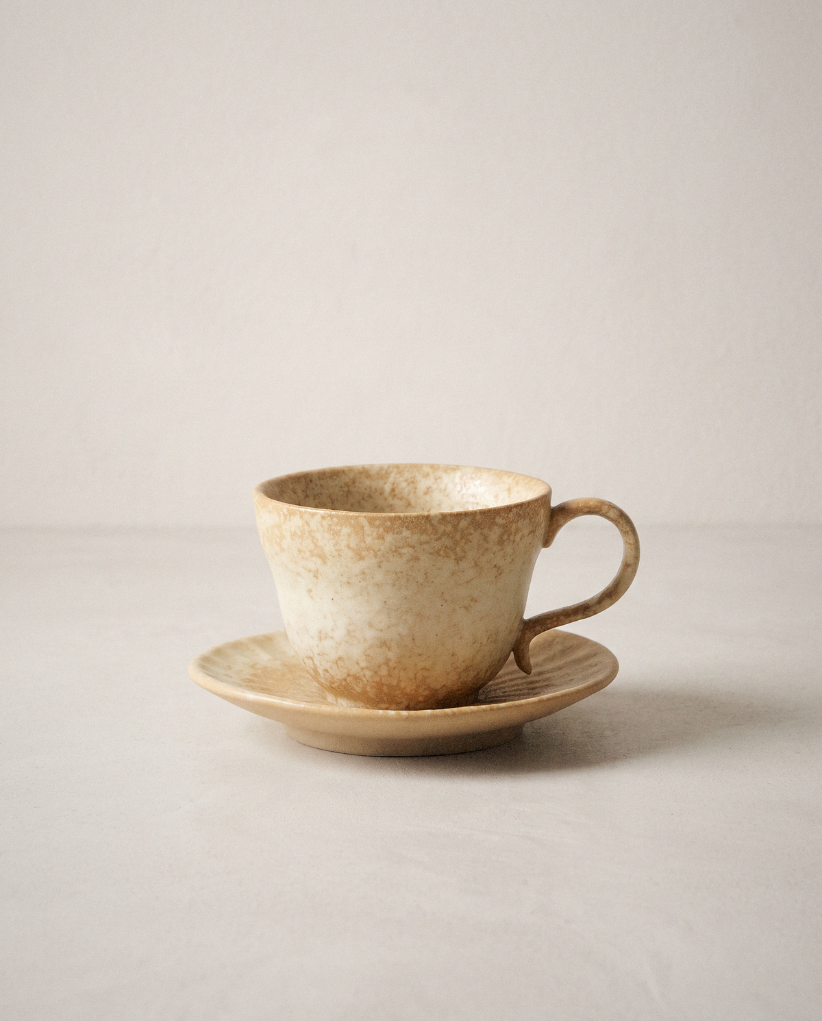 Speckled Cream Tea Cup Set in a bright organic modern interior