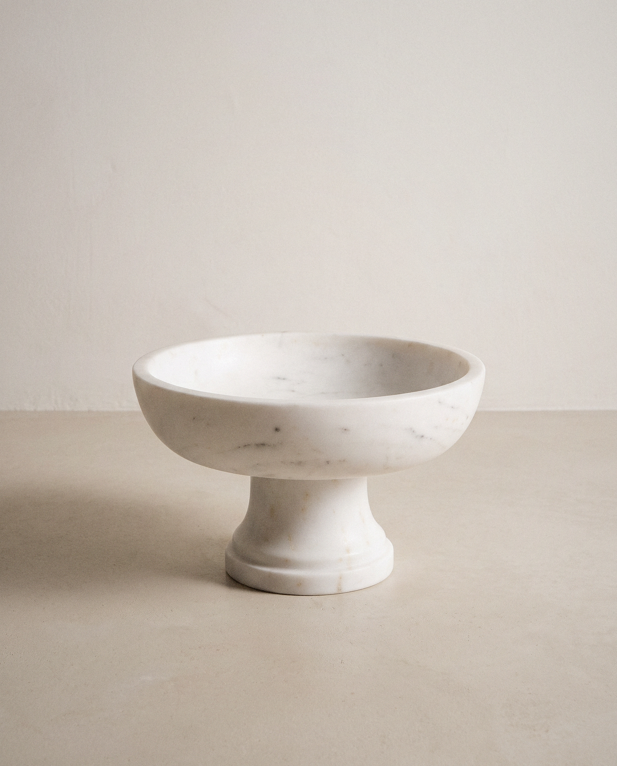 Marble Pedestal Bowl in a bright organic modern interior