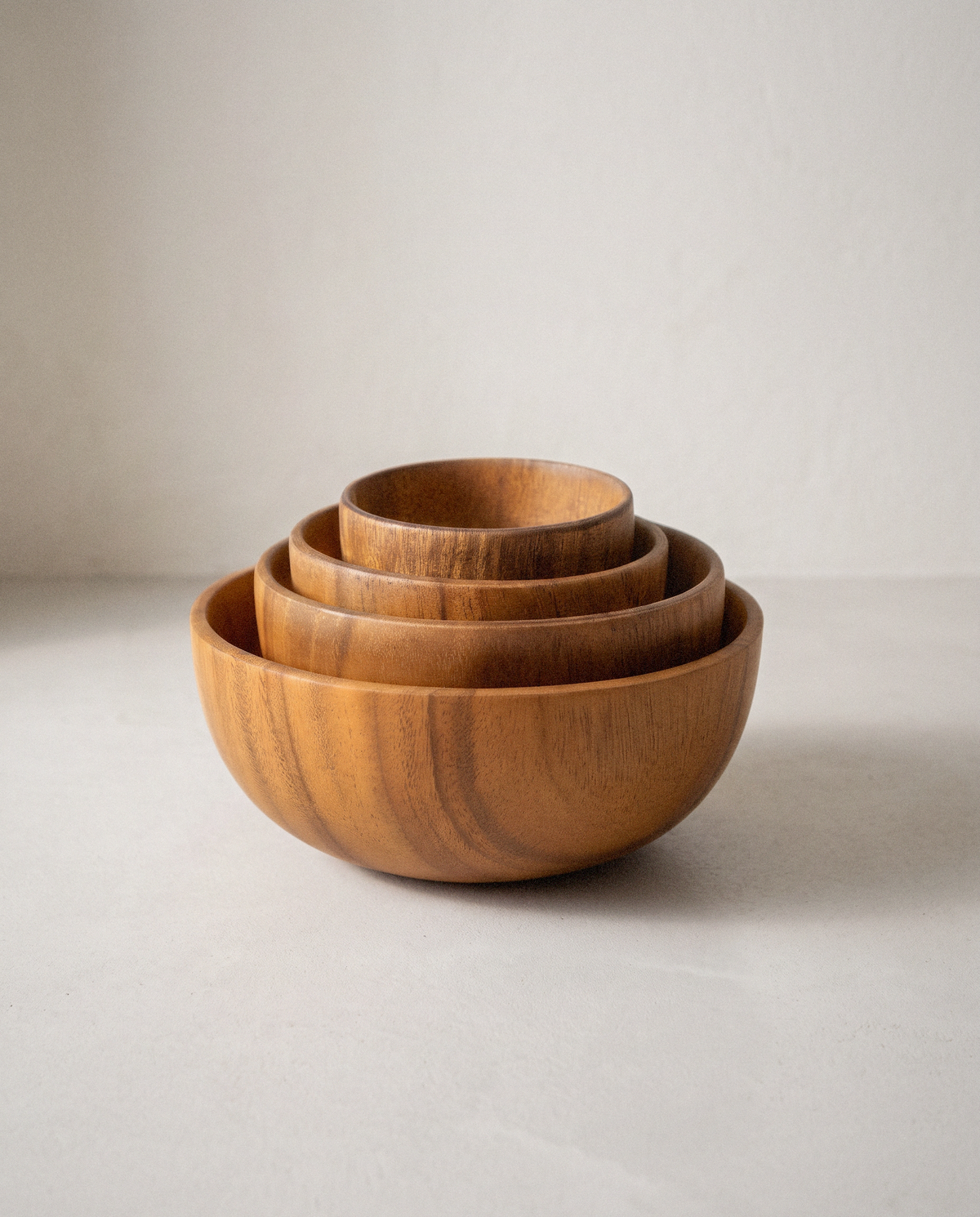 Acacia Wood Serving Bowls in a bright organic modern interior