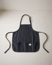 Kids Canvas Apron in a bright organic modern interior