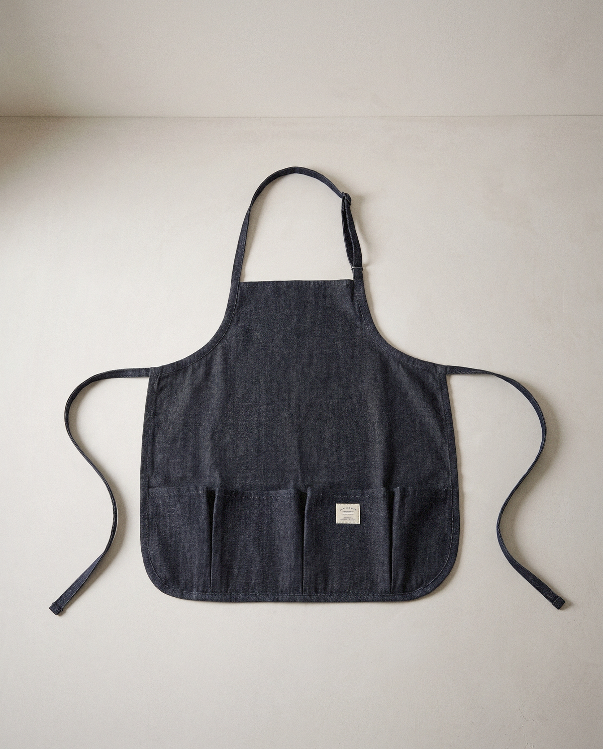 Kids Canvas Apron in a bright organic modern interior