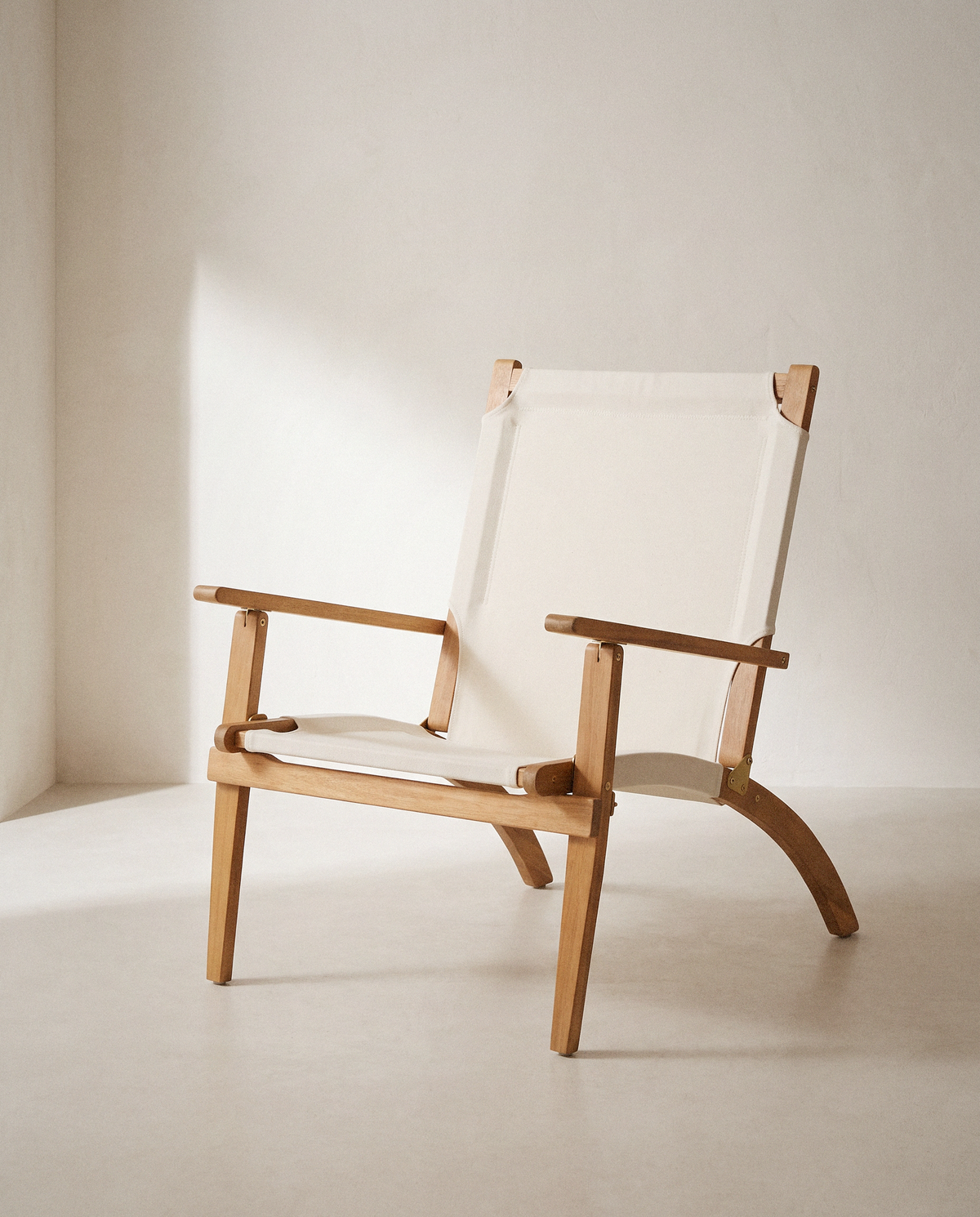 Walker Wooden Folding Chair in a bright organic modern interior