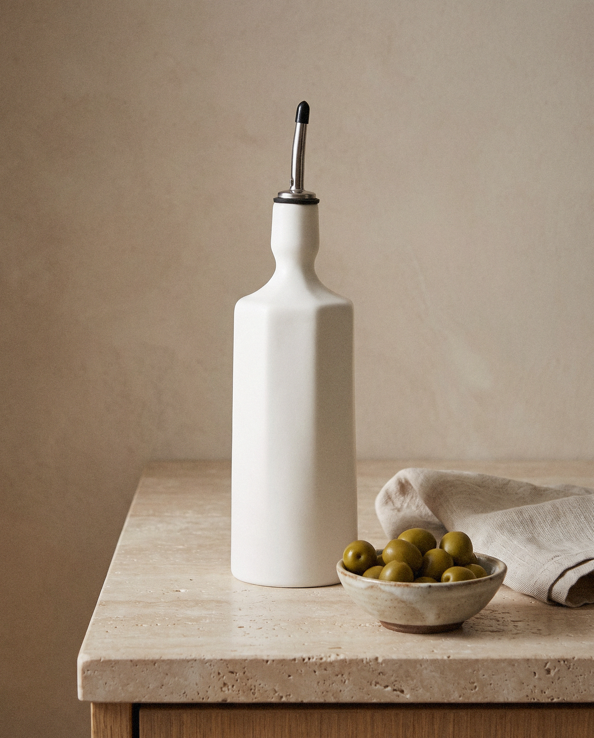 Elixir Olive Oil Dispenser styled in a calm minimalist living space