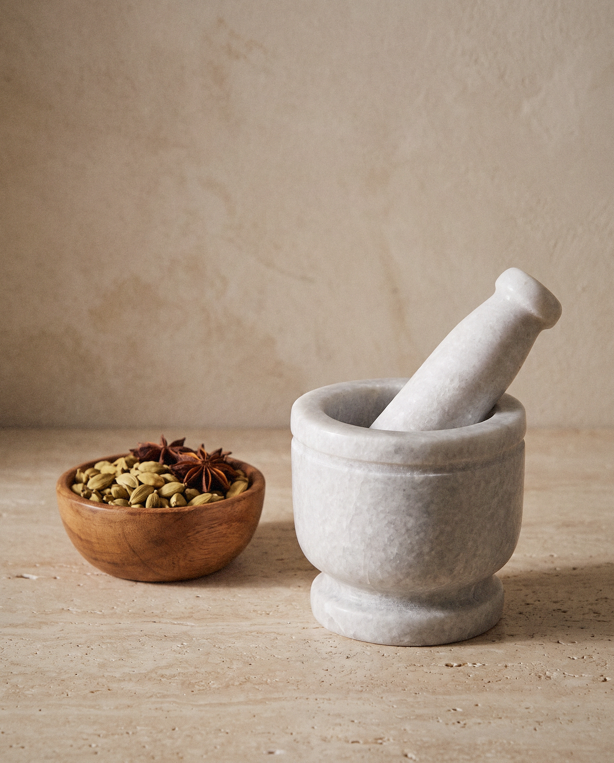 Cassia Marble Mortar & Pestle styled in a calm minimalist living space