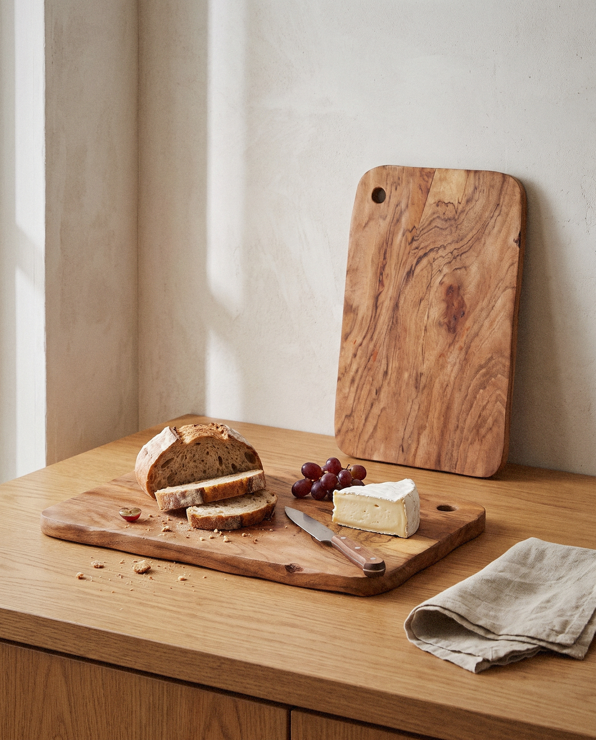 Alto Acacia Cutting Boards, Set of 2 styled in a calm minimalist living space