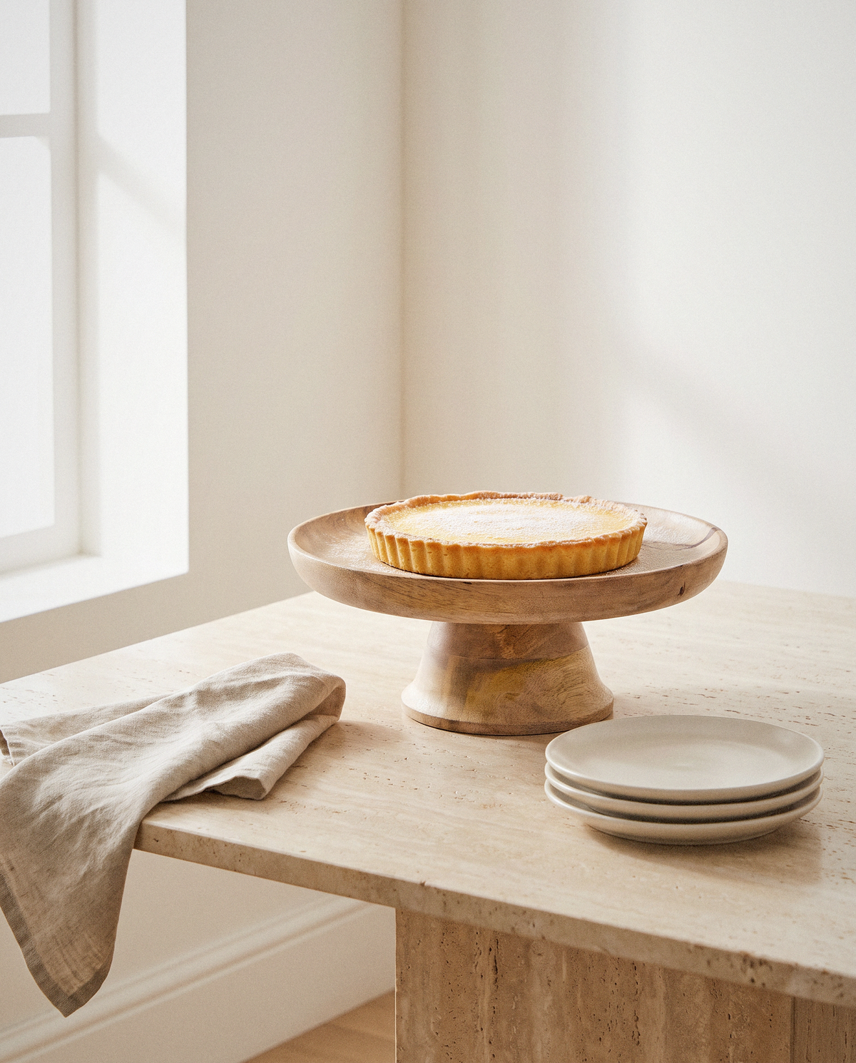 Brielle Mango Wood Cake Stand styled in a calm minimalist living space
