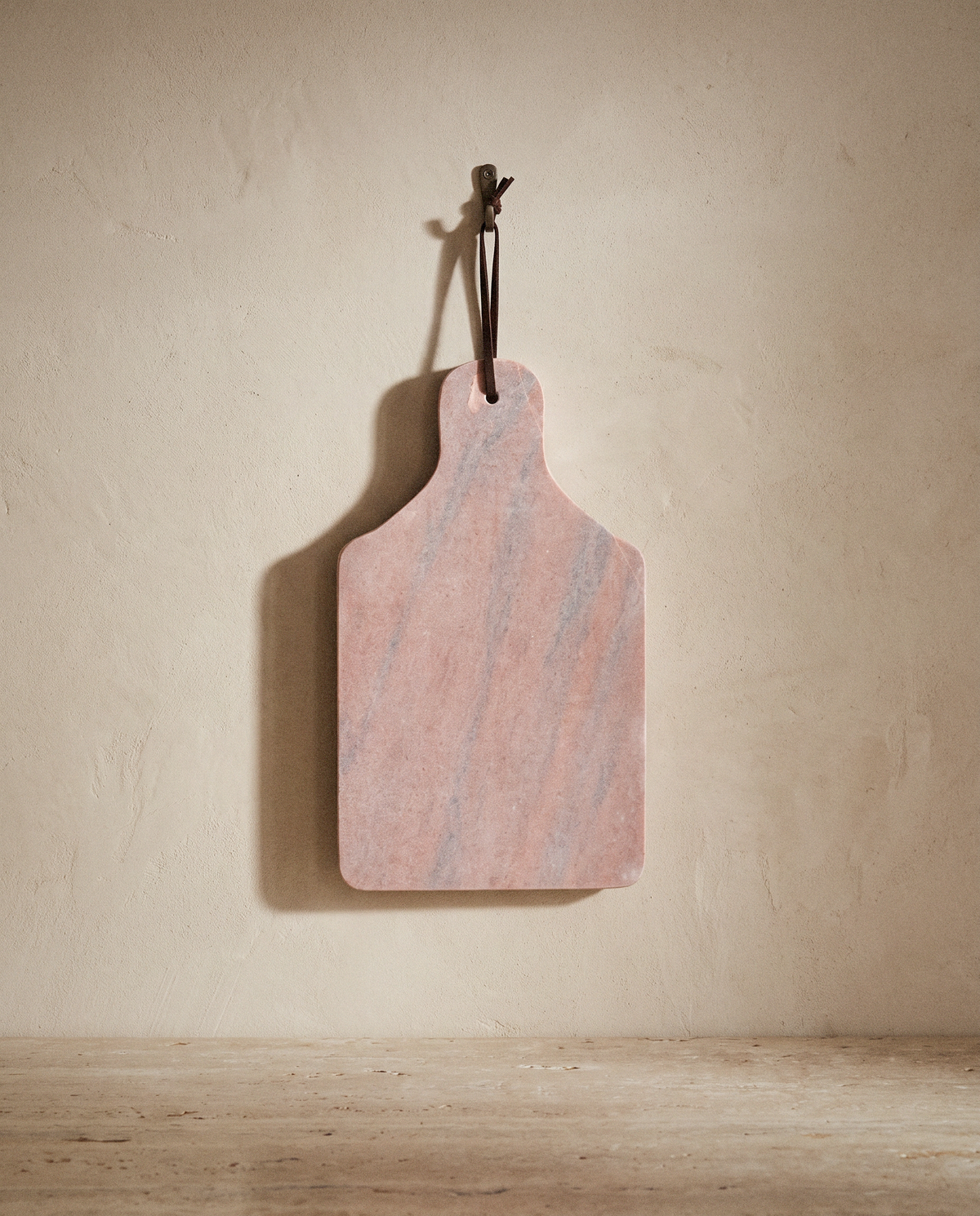 Clara Rose Marble Serving Board detail in warm natural light